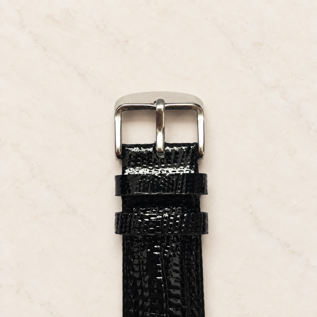 Boucle argentée et passants du bracelet grain lézard noir